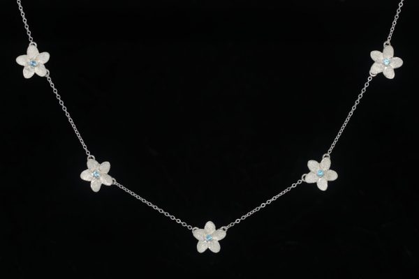 Necklace of five xs plumeria with blue topaz