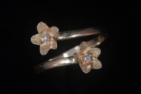 14k gold plumeria bypass ring with diamond